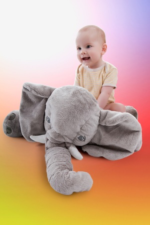 Baby girl playing with her toyの写真素材