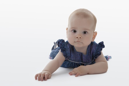 Beautiful baby girl in a cute dress