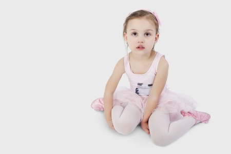Sweet little ballet dancer during her breakの写真素材
