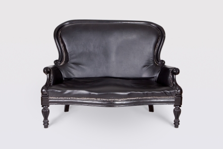 Black leather vintage sofaの写真素材