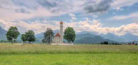 Beautiful landscape with the St. Coleman's Church in Bavariaの写真素材