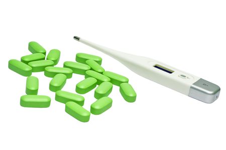 thermometer and tablet on white background