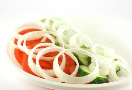 Salad with tomato, cucumber and onionの写真素材