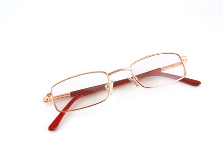 Golden optical glasses isolated on white