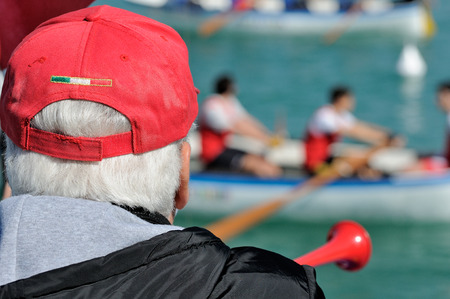 referee canoe race with red capの写真素材
