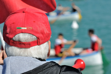 referee canoe race with red capの写真素材