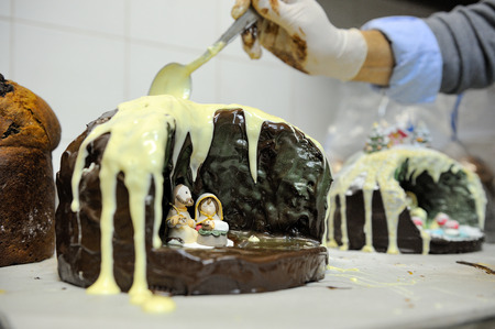 little crib in the traditional chocolat italian christmas cakeの写真素材