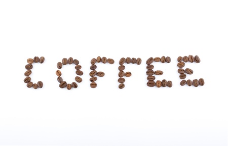 Coffee beans are laid out in the wordの写真素材