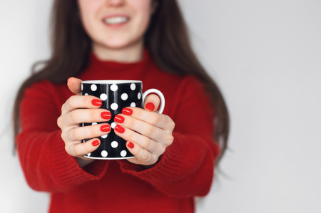 cup of coffee in handsの写真素材