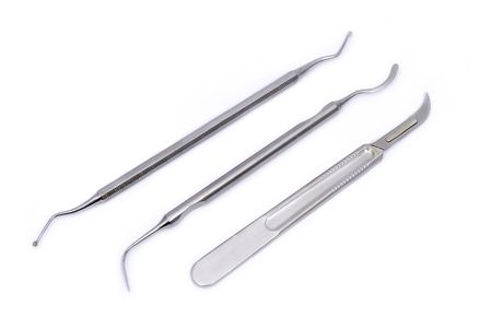 set of dental appliances: a scalpel, plugger and excavatorsの写真素材