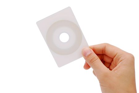 cd business card in his hand on a white backgroundの写真素材