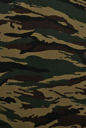 Close up camouflage fabric in a vertical orientationの写真素材