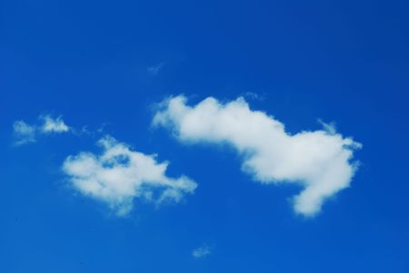 A white cloud in the blue sky