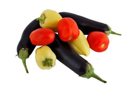 vegetables: tomatoes, eggplant and peppers on a white backgroundの写真素材