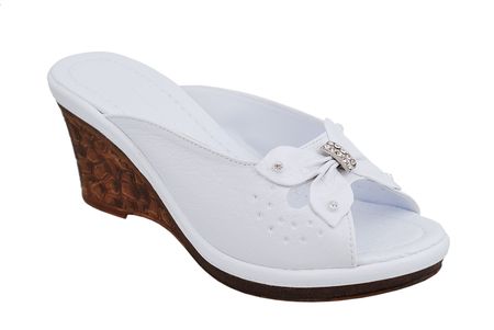 Women's Wedge-heeled shoes on a white backgroundの写真素材
