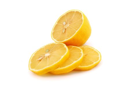 chopped lemon slices on white backgroundの写真素材