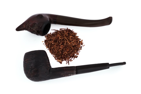 two old pipe tobacco on a white backgroundの写真素材