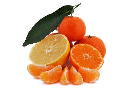 tangerines and lemon with leaves on white backgroundの写真素材