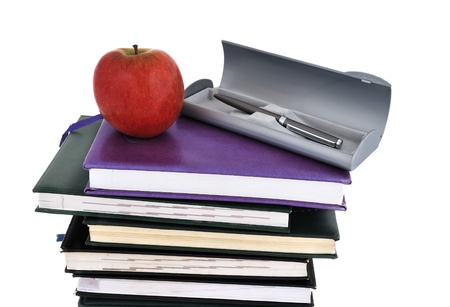 apple and books on a white backgroundの写真素材