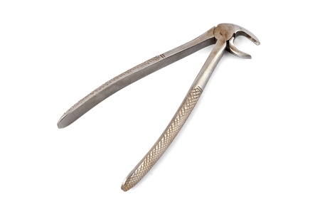 old dental pliers on a white backgroundの写真素材