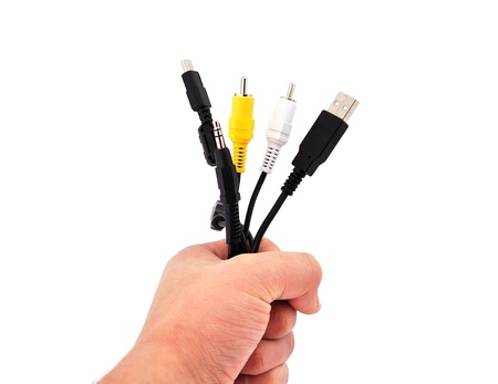 computer wire in his hand on a white backgroundの写真素材