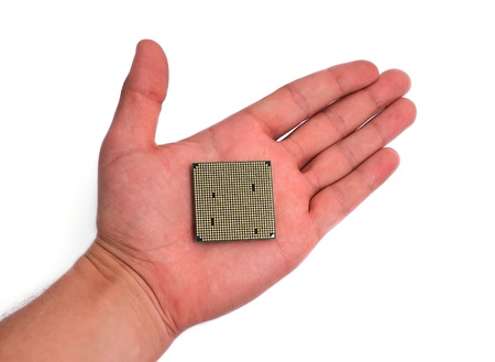 cpu in hand on white backgroundの写真素材