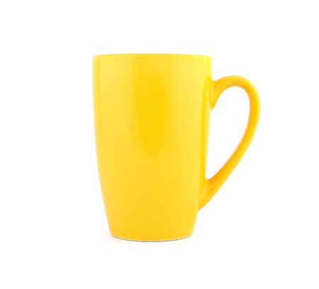 empty yellow cup  on a white backgroundの写真素材