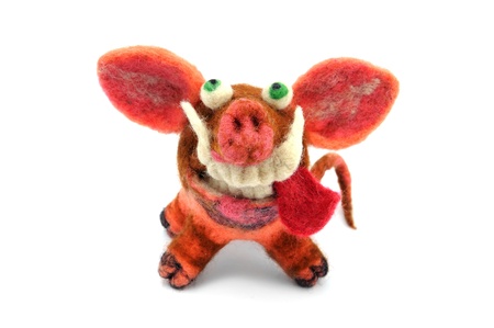 soft toy pig on a white backgroundの写真素材