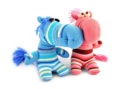 two soft toy on a white backgroundの写真素材