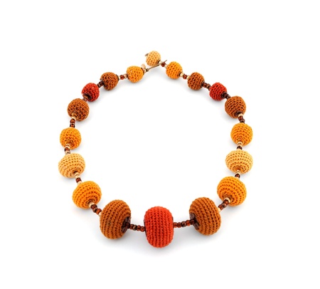 decorative crocheted beads on a white backgroundの写真素材