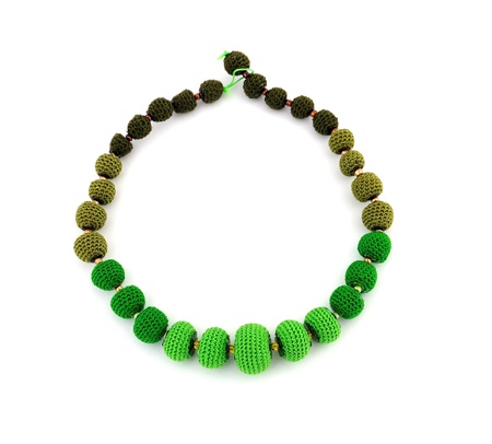 decorative crocheted beads on a white backgroundの写真素材