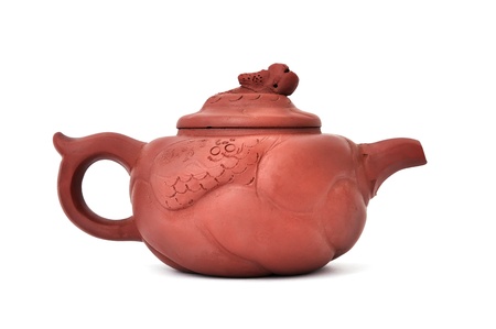 brown ceramic teapot on a white backgroundの写真素材
