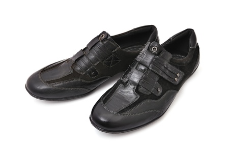 black athletic shoes on white backgroundの写真素材