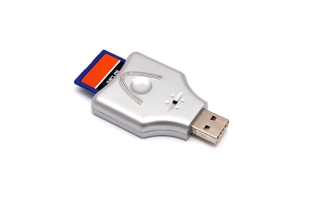 reader with a memory card on a white backgroundの写真素材