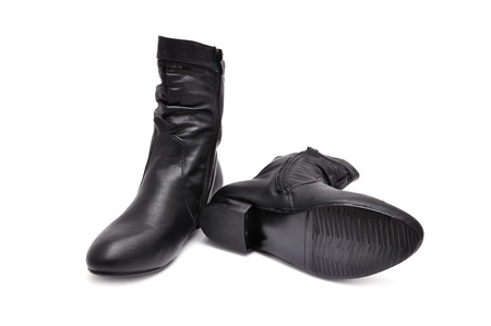 black women's boots on a white backgroundの写真素材