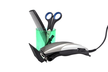 hair shaver, comb and scissors   on white backgroundの写真素材
