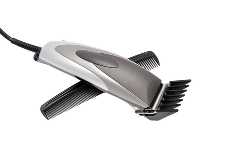 hair shaver and comb   on white backgroundの写真素材