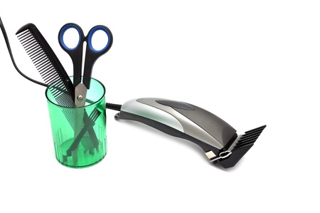 hair shaver, comb and scissors   on white backgroundの写真素材