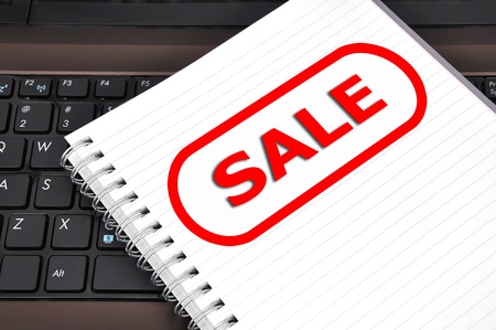 notebook, diary and red banner saleの写真素材