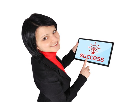 woman holding  touch pad with success symbolの写真素材