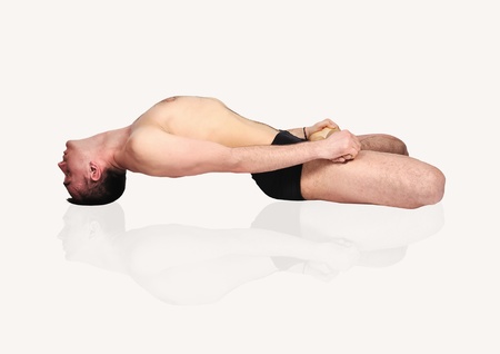 man practicing yoga in position