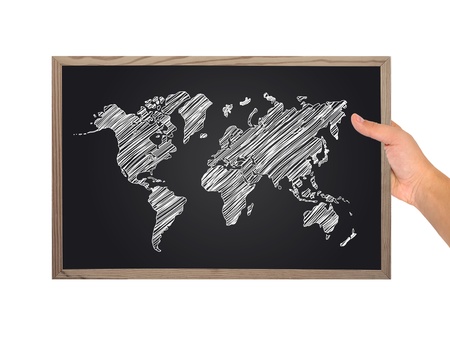 hand holding blackboard with world mapの写真素材