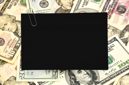 black paper on money backgroundの写真素材