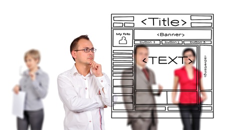 businessman looking at drawing template web pageの写真素材