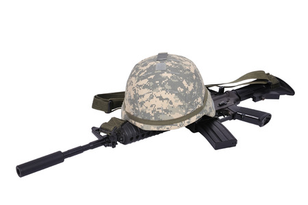 assault rifle and helmet  on white 
