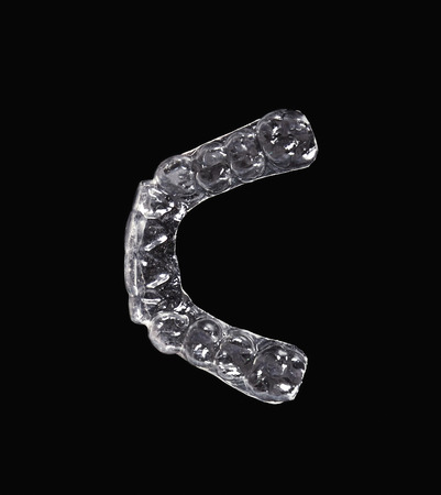 dental splint on a black background