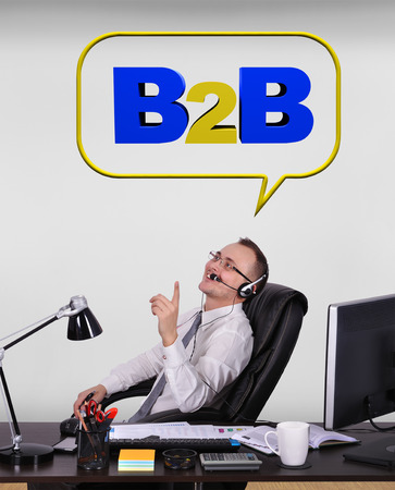 happy customer service representative dreaming at business to businessの写真素材