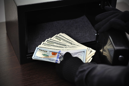 Thief steals dollars from the open safe