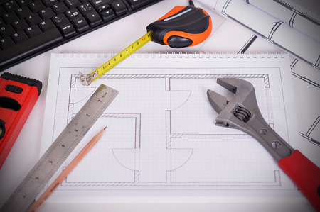 apartment blueprint  and tools on the tableの写真素材