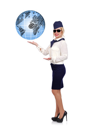 stewardess in uniform holding globe on white backgroundの写真素材